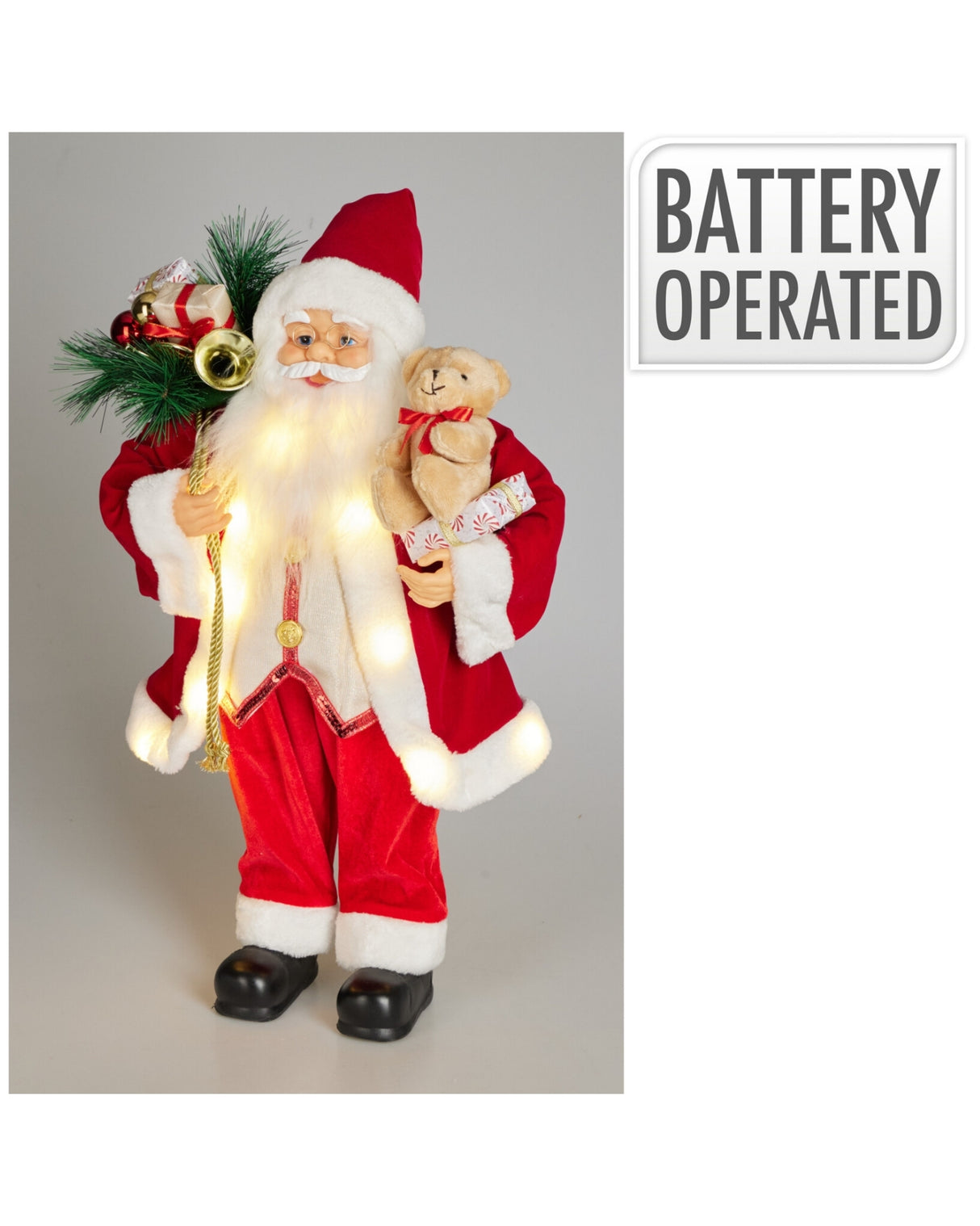 Julemand stående med bamse